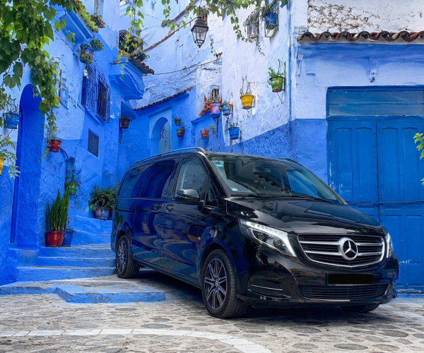 Black Mercedes Vito in the blue streets of Chefchaouen Morocco during a luxury private tour with MR VIP Driver
